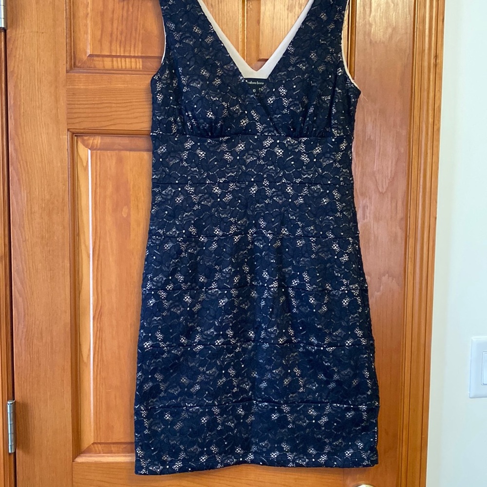 Black lace over cream dress
